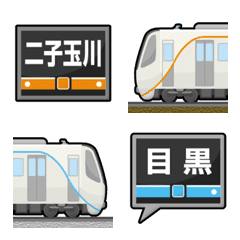 東京 橙/水色ラインの私鉄電車と駅名標